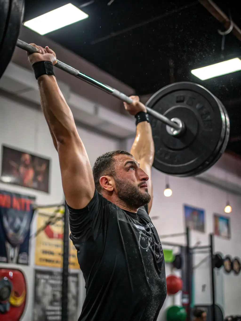 A high-resolution photograph of a weightlifter in action, demonstrating strength and determination in a gym setting, perfect for marketing materials.